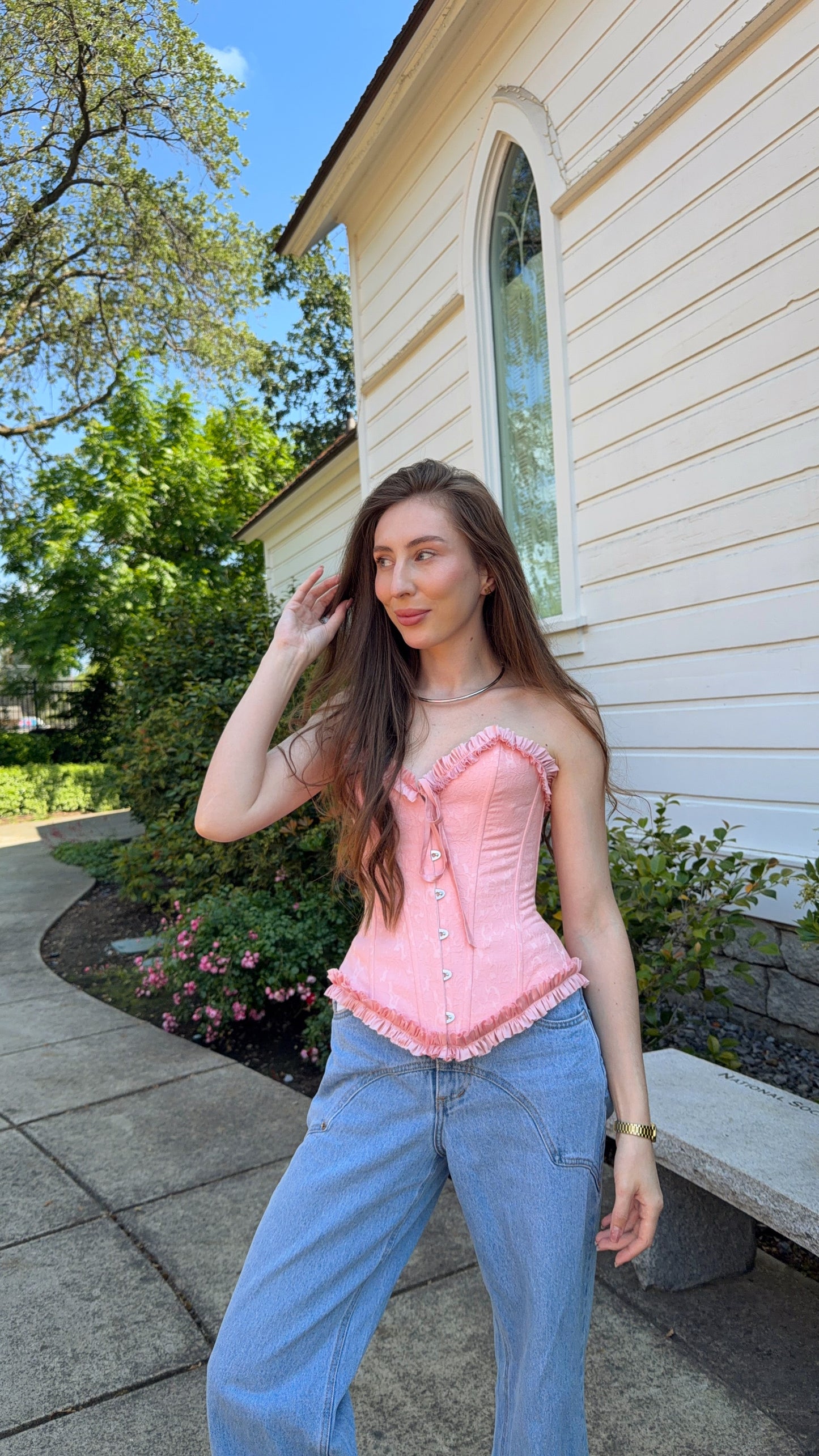 Pink corset with ruffles