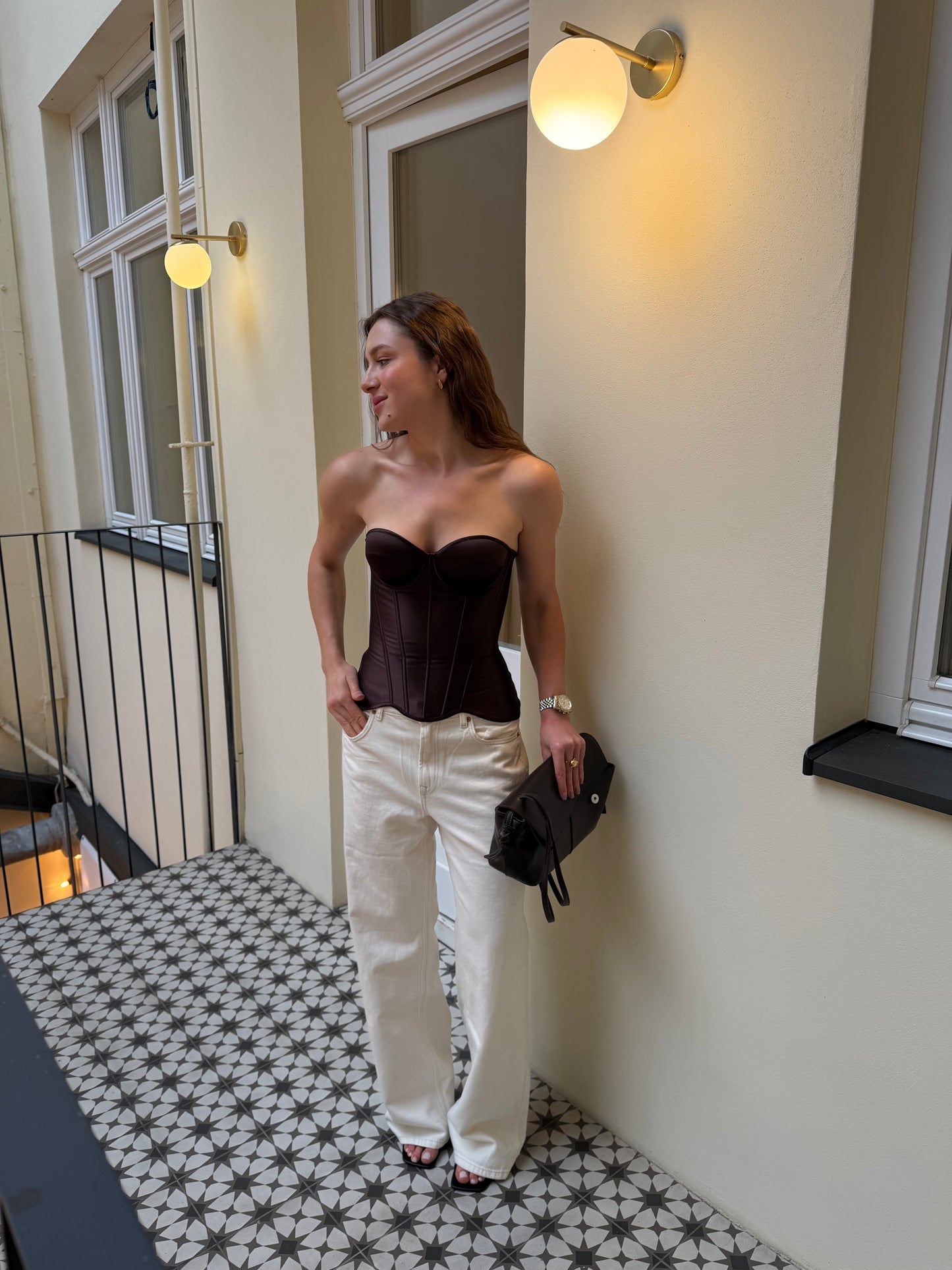 Structured brown corset top with sculpted silhouette